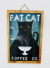 Hand-painted Fat Cat wooden sign with coffee cup illustration and hanging rope on white background.