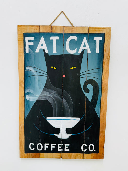 Hand-painted Fat Cat wooden sign with coffee cup illustration and hanging rope on white background.