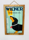 Hand-painted Wiener Dog wooden sign with beer glass illustration and hanging rope on white background.