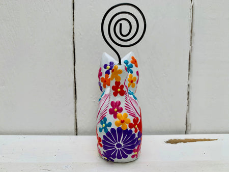 back view of sitting flower kitty 