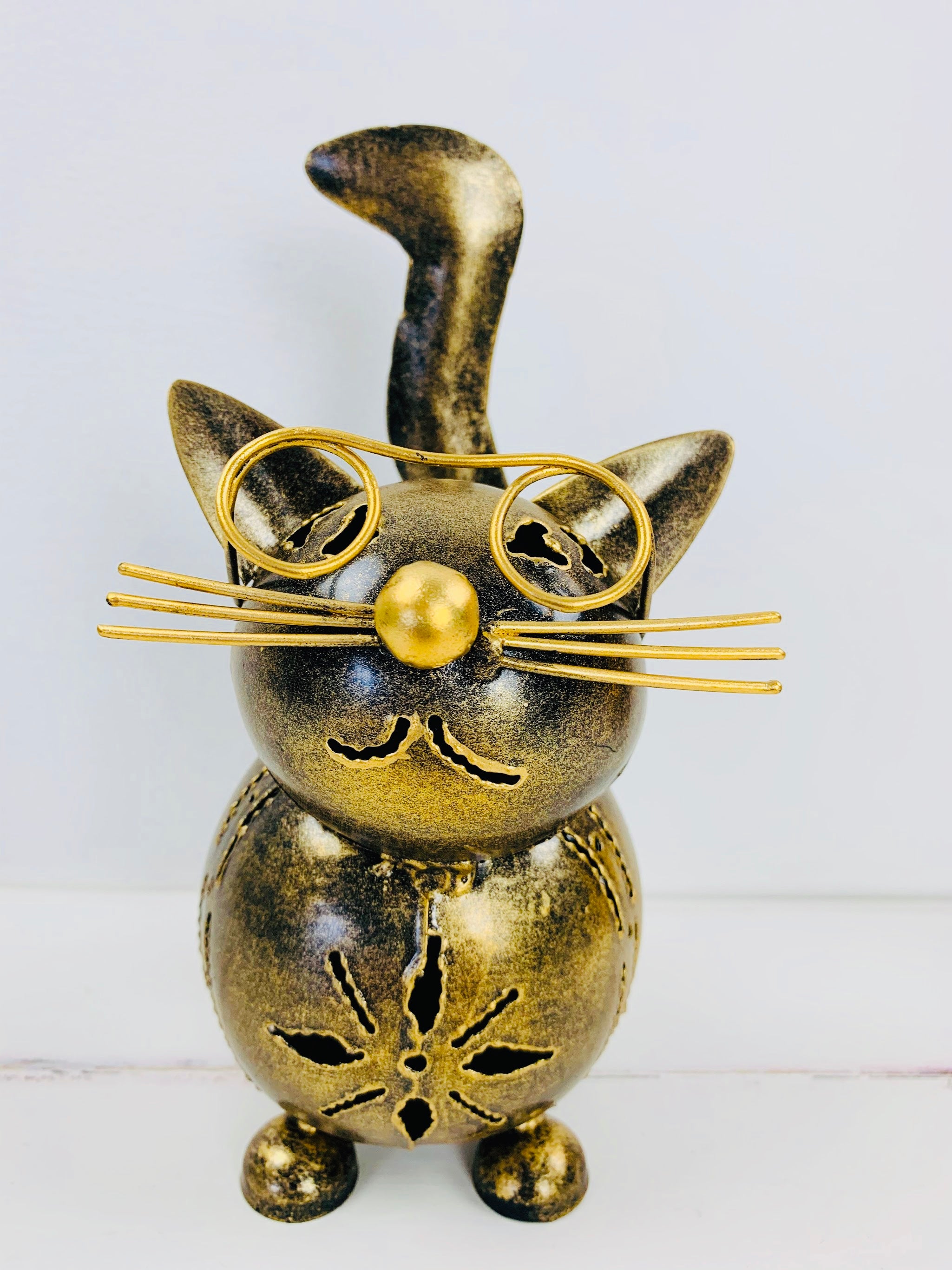 front view of metal cat called molly