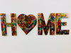 front view of mosaic home letters on white background