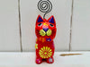 front view of red wooden flower kitty