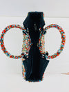 aerial view of beaded bag opening