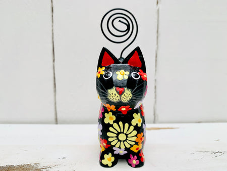 front view of sitting flower kitty
