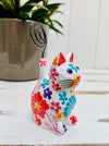 side view of wooden flower kitty in white