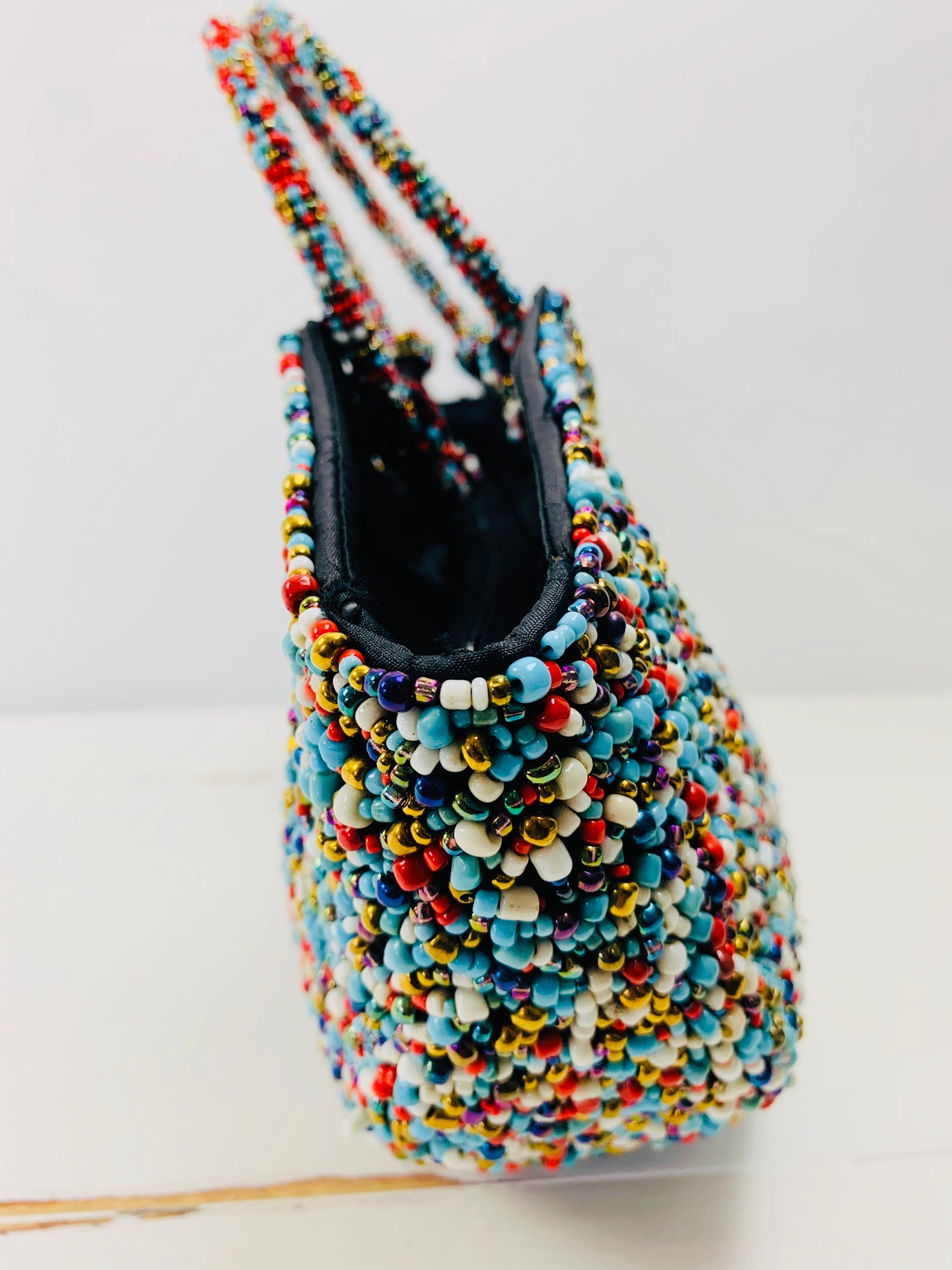 side close up of beaded handbag