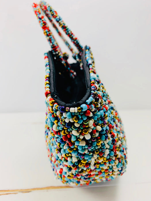 side close up of beaded handbag