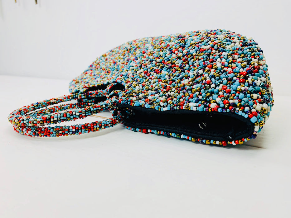 side close up of beaded handbag