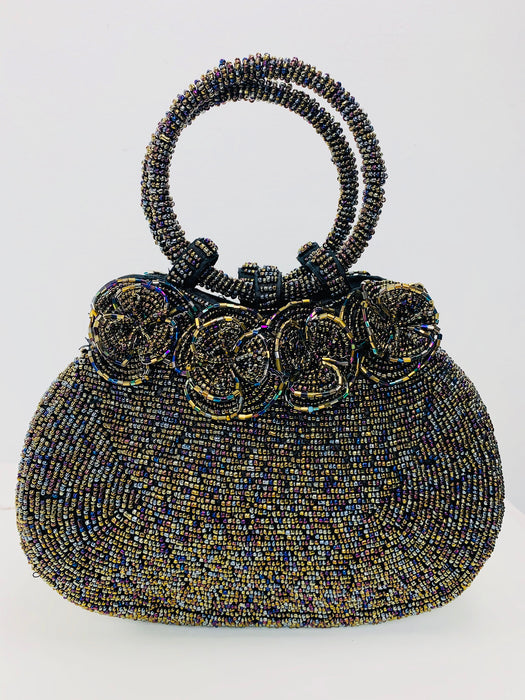 front view of beaded handbag with beaded flowers on