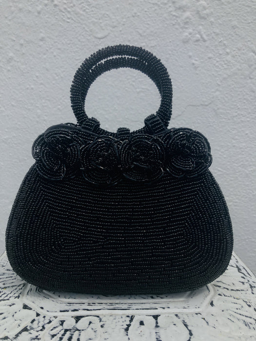 front view of black beaded handbag