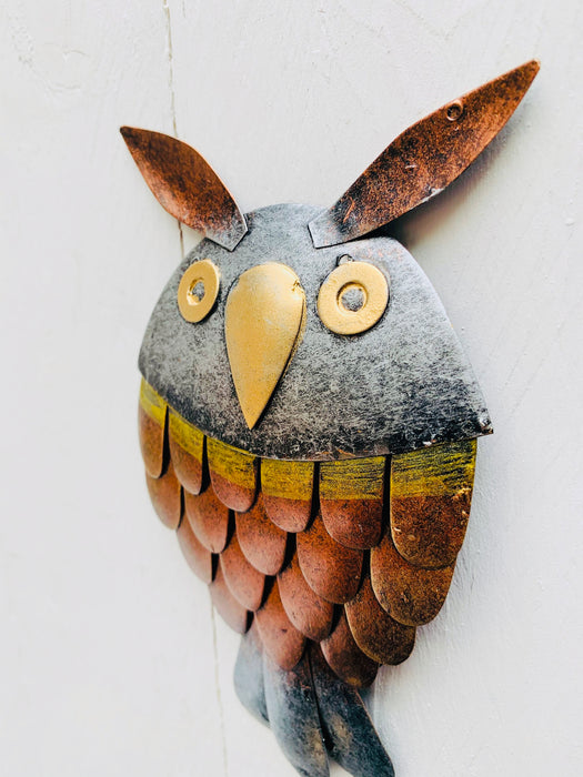 side view of metal owl hook