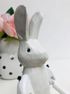 close up view of head of wooden bunny