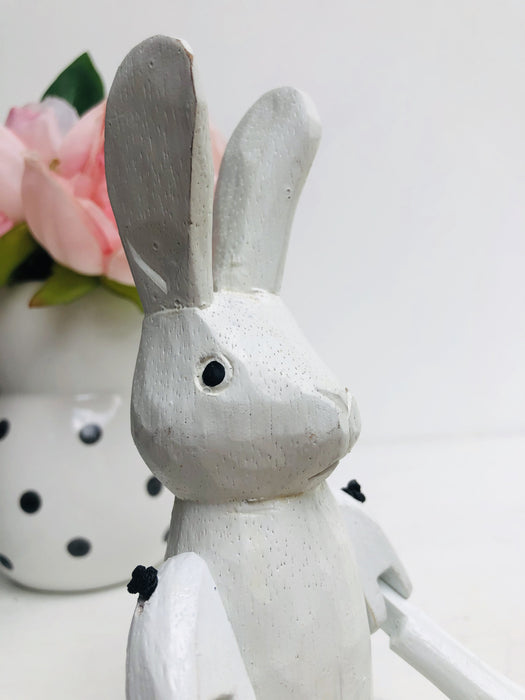 close up view of head of wooden bunny
