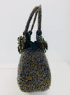 side view of beaded handbag 