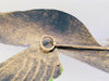 close up of the back hook of the metal hook