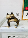 front view of metal cat