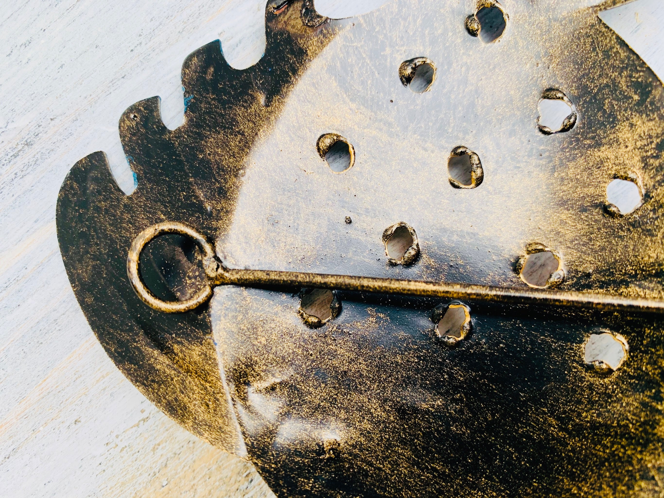 close up of metal fish hook at the back