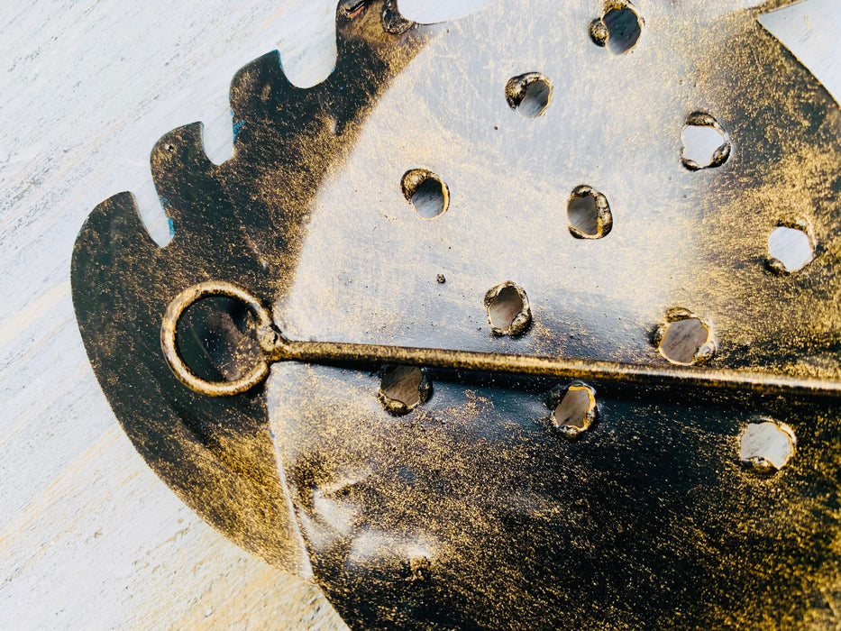 close up of metal fish hook at the back