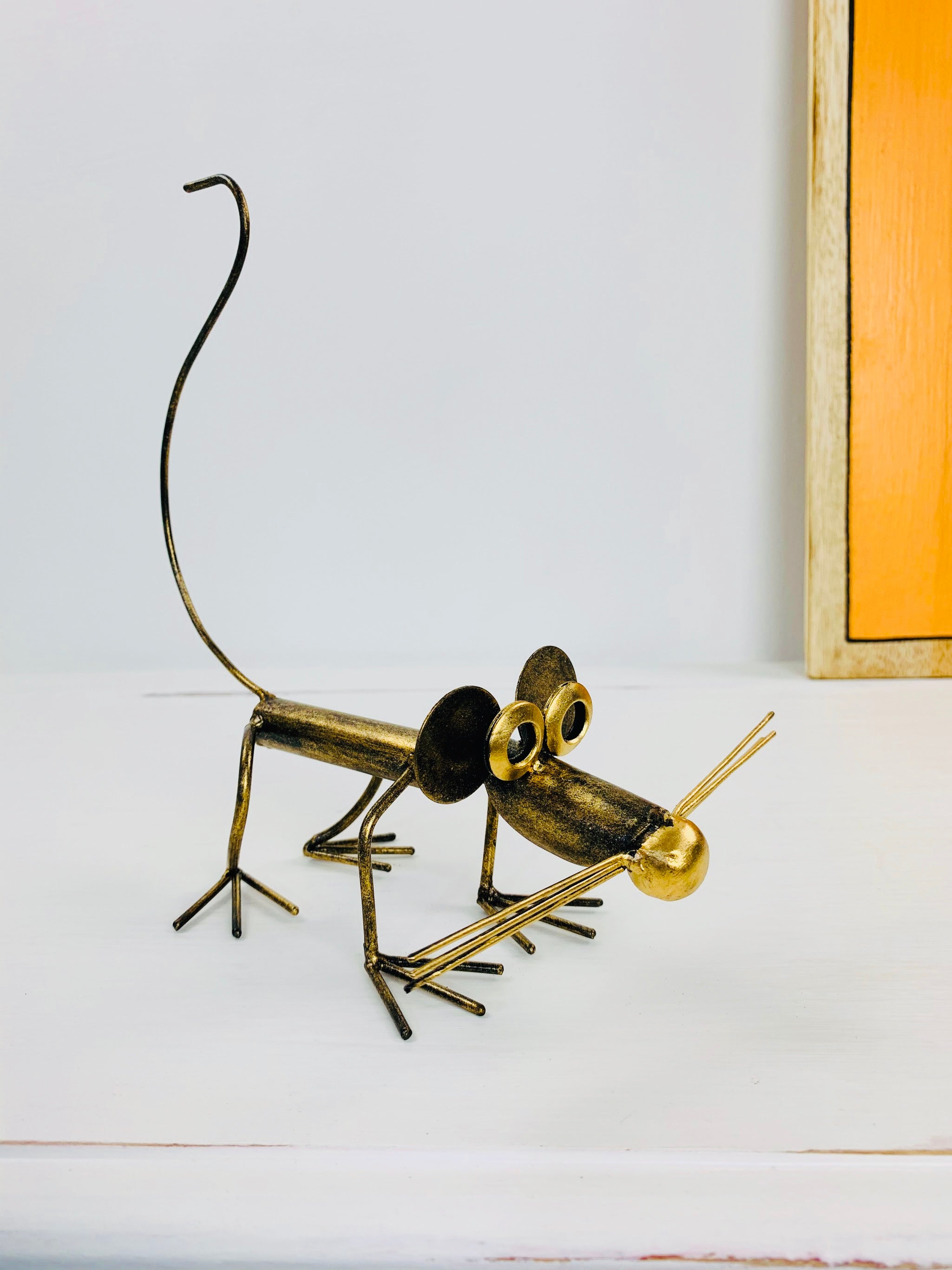 side view of metal mouse basil