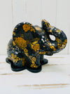 side view of mosaic elephant lamp light off