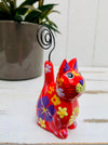 side view of wooden sitting flower kitty