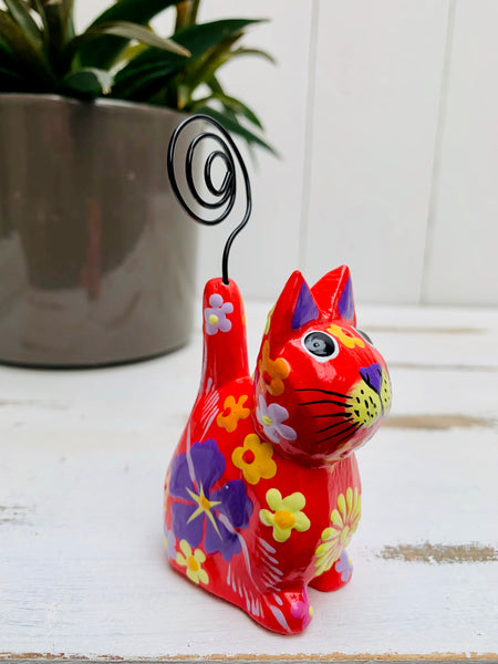 side view of wooden sitting flower kitty