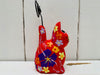 side view of wooden flower kitty