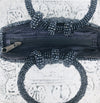 aerial view of beaded handbags opening