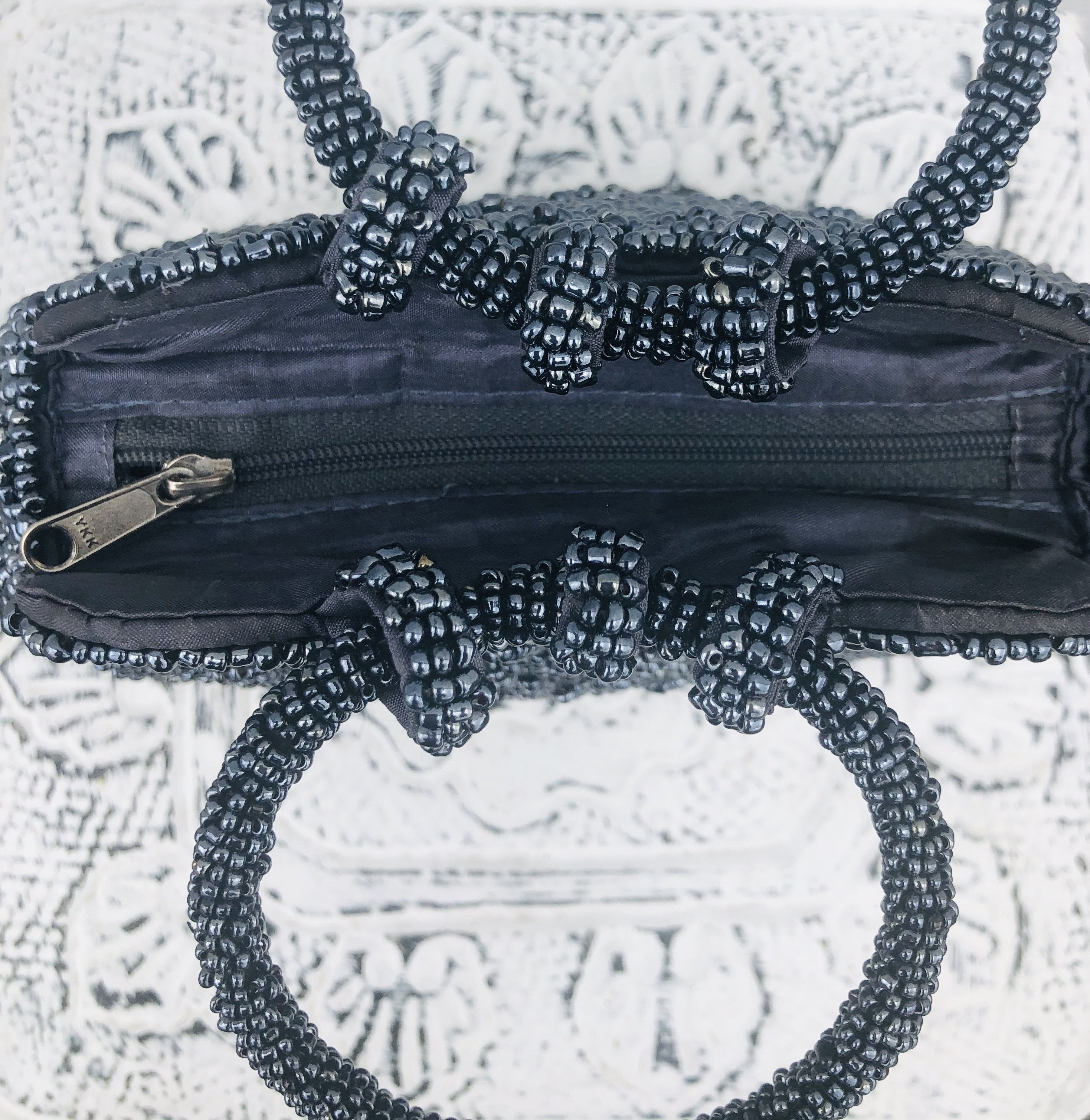 aerial view of beaded handbags opening
