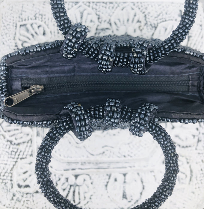 aerial view of beaded handbags opening