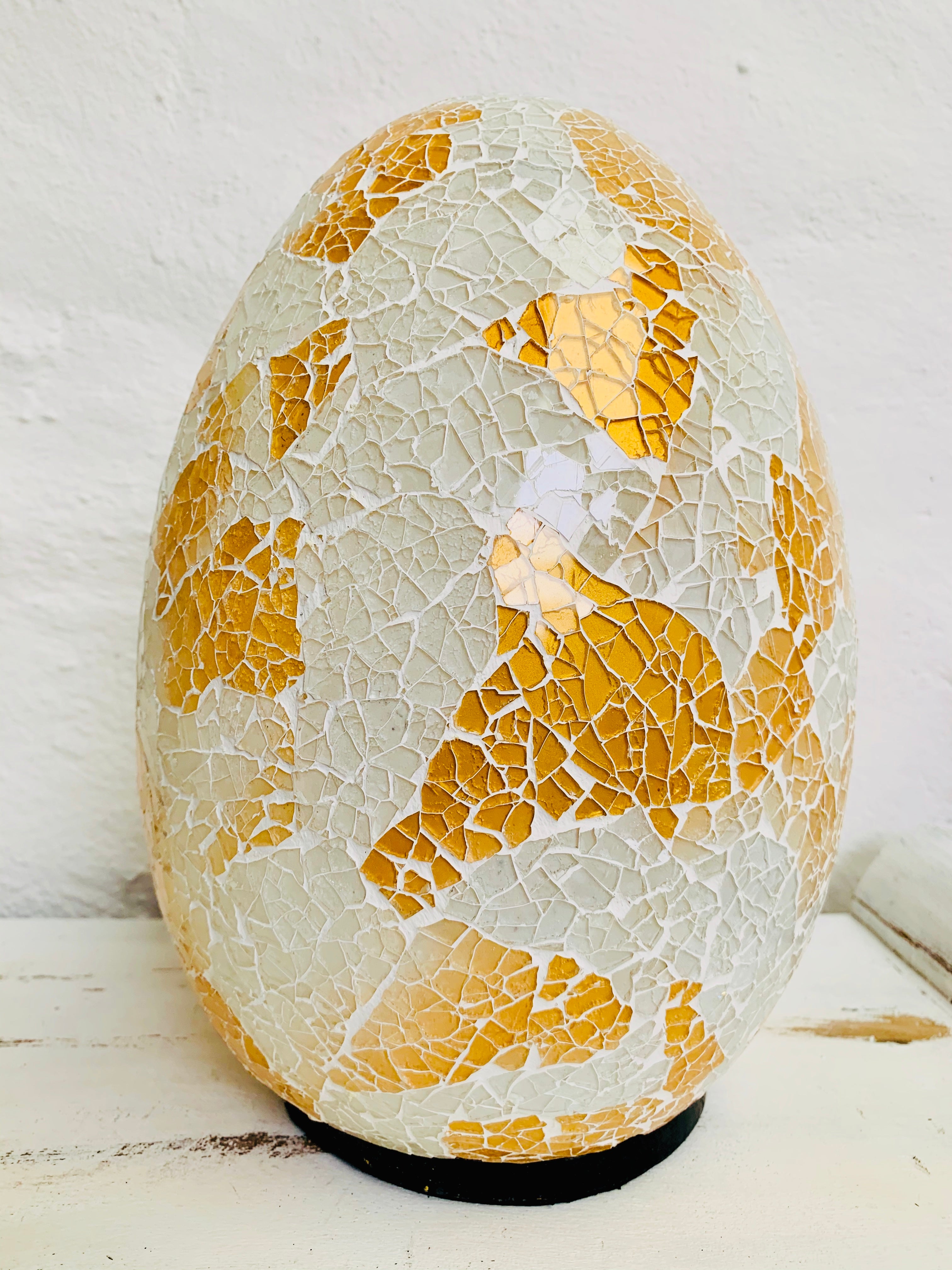 front view of mosaic egg lamp with light off