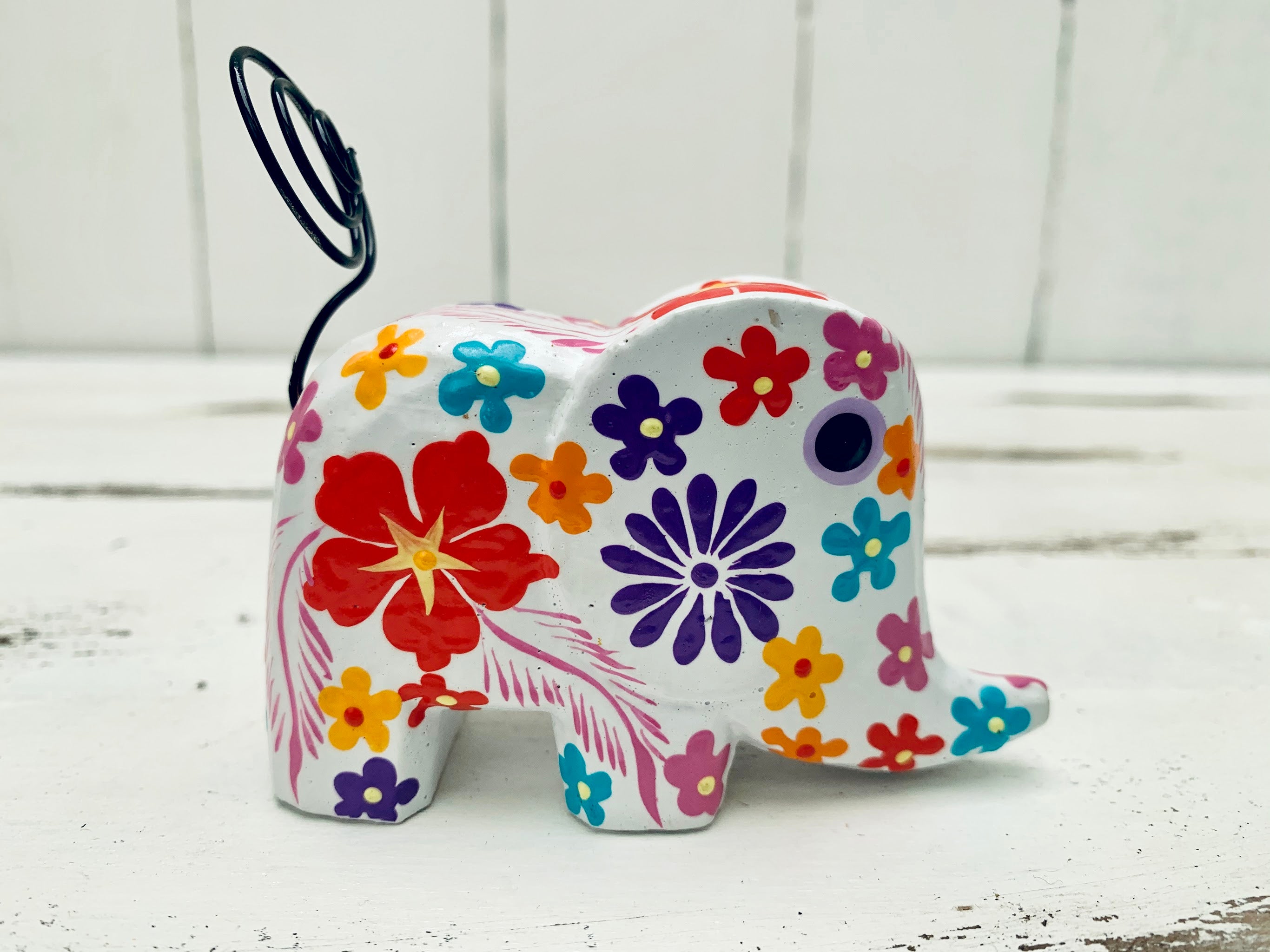 side view of wooden mini flower elephant