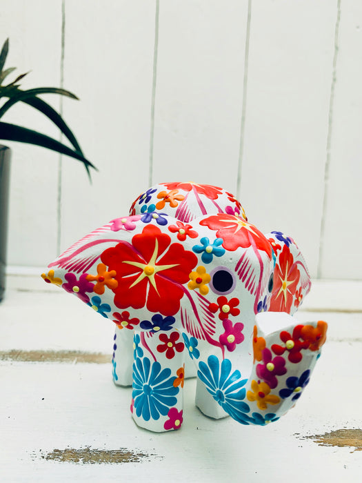 front view of wooden flower elephant in white