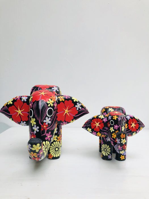 front view of large and small flower elephants