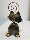back view of metal tubby kitty