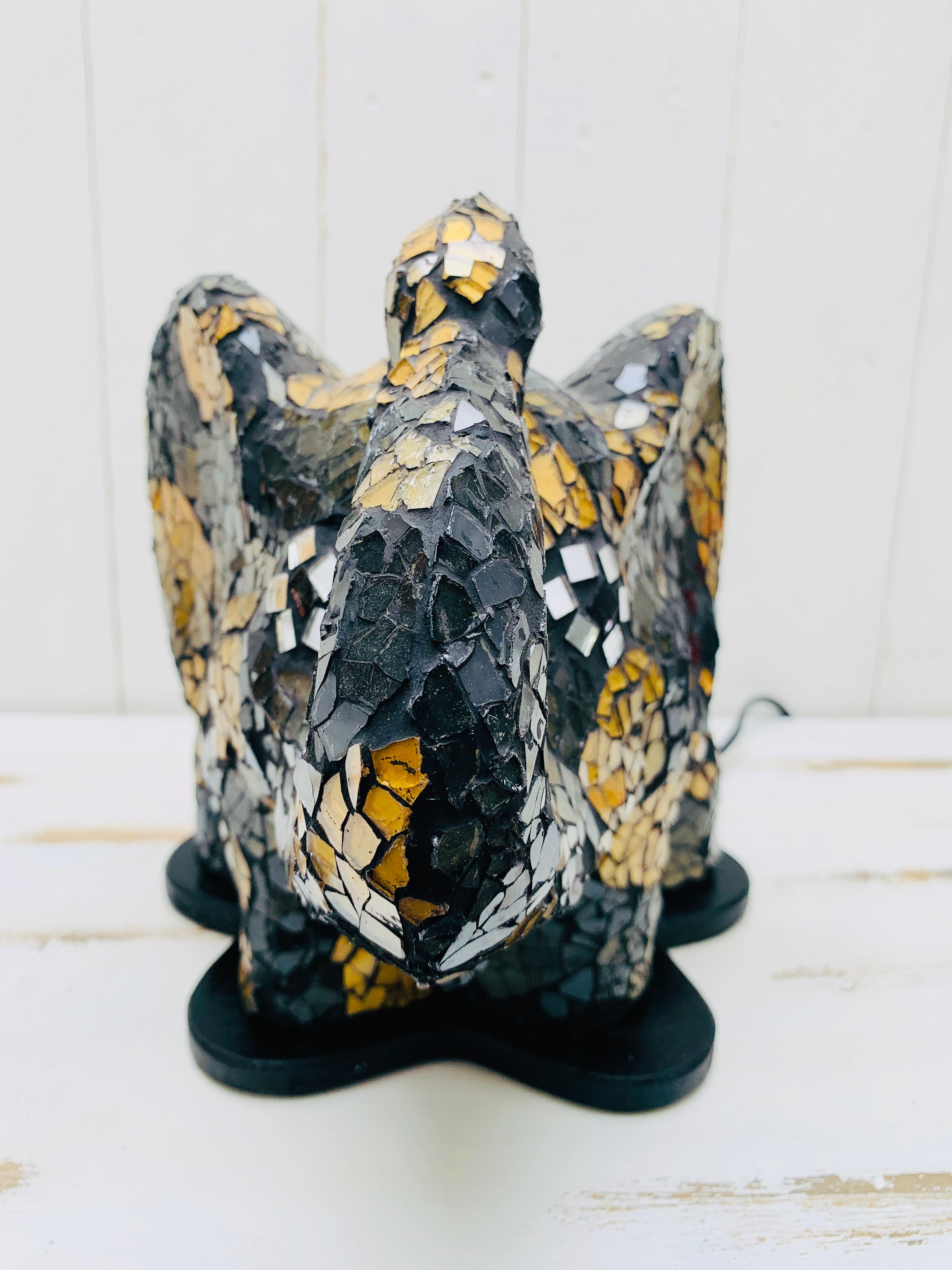 front view of mosaic elephant lamp light off