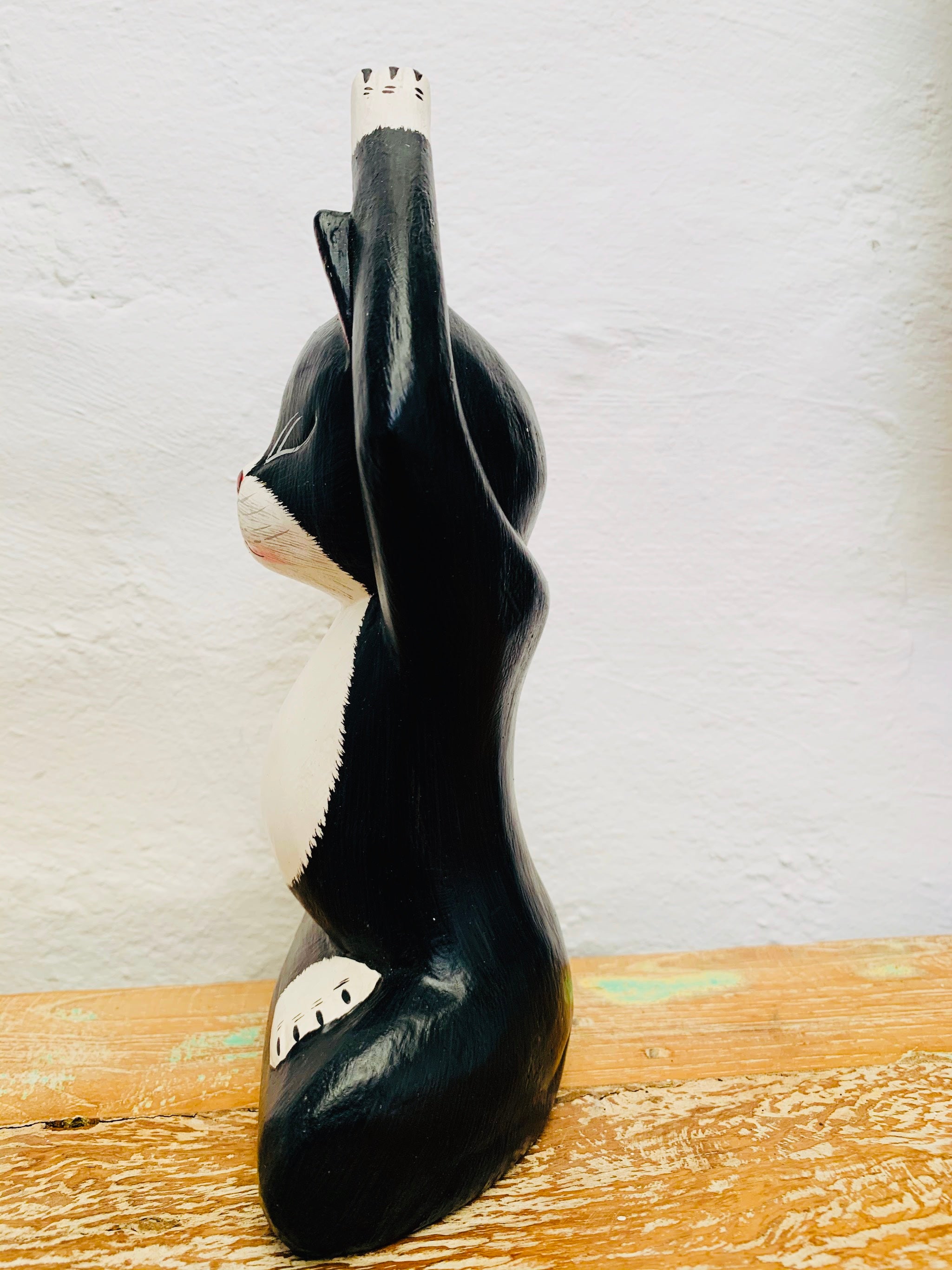 side view of wooden yoga kitty