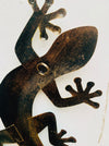 back view of metal rainbow gecko with hook attached