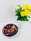 aerial view of mosaic bowl and a vase of flowers