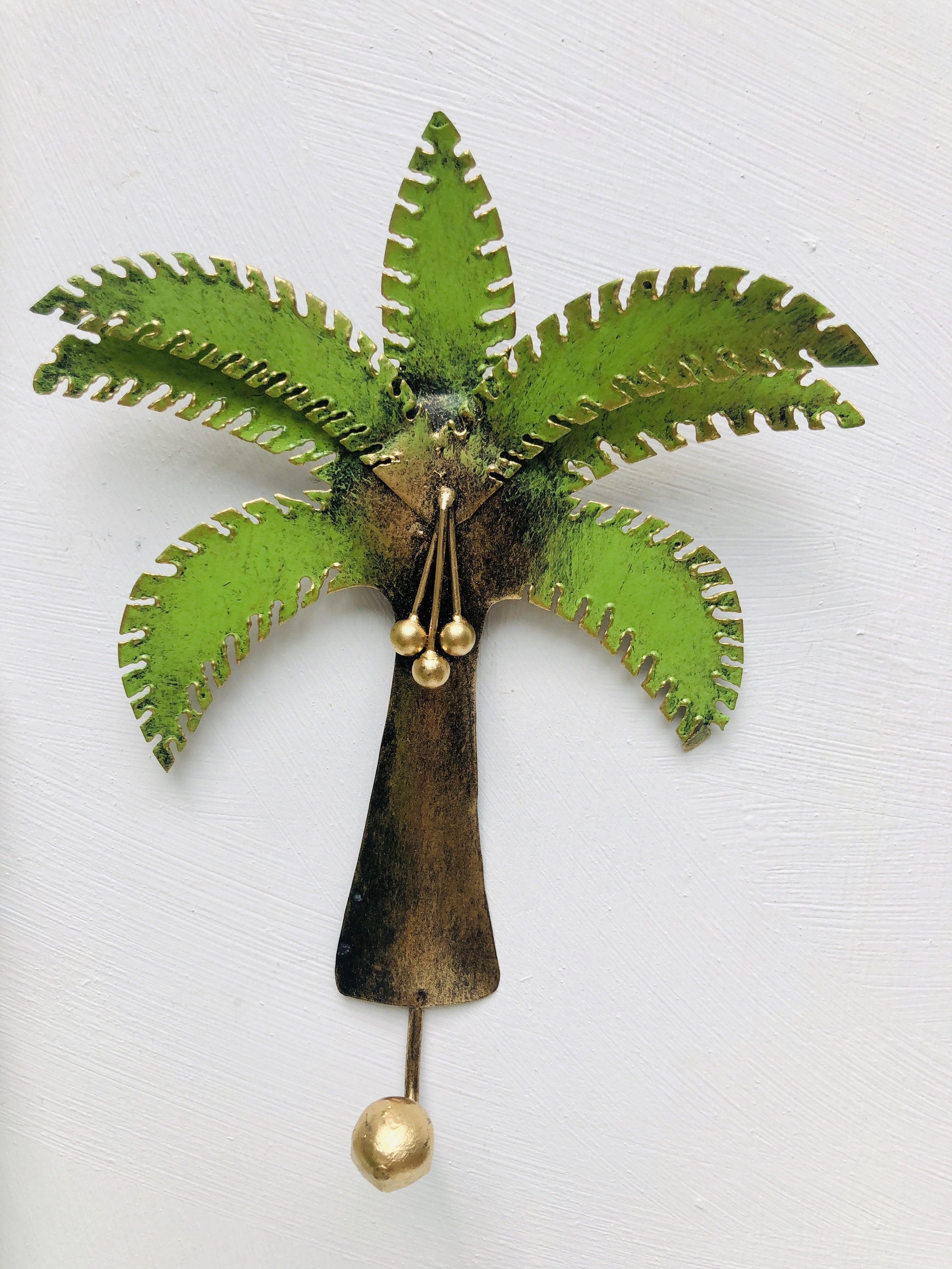 front view of palm tree hook