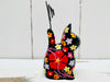 side view of wooden sitting flower kitty