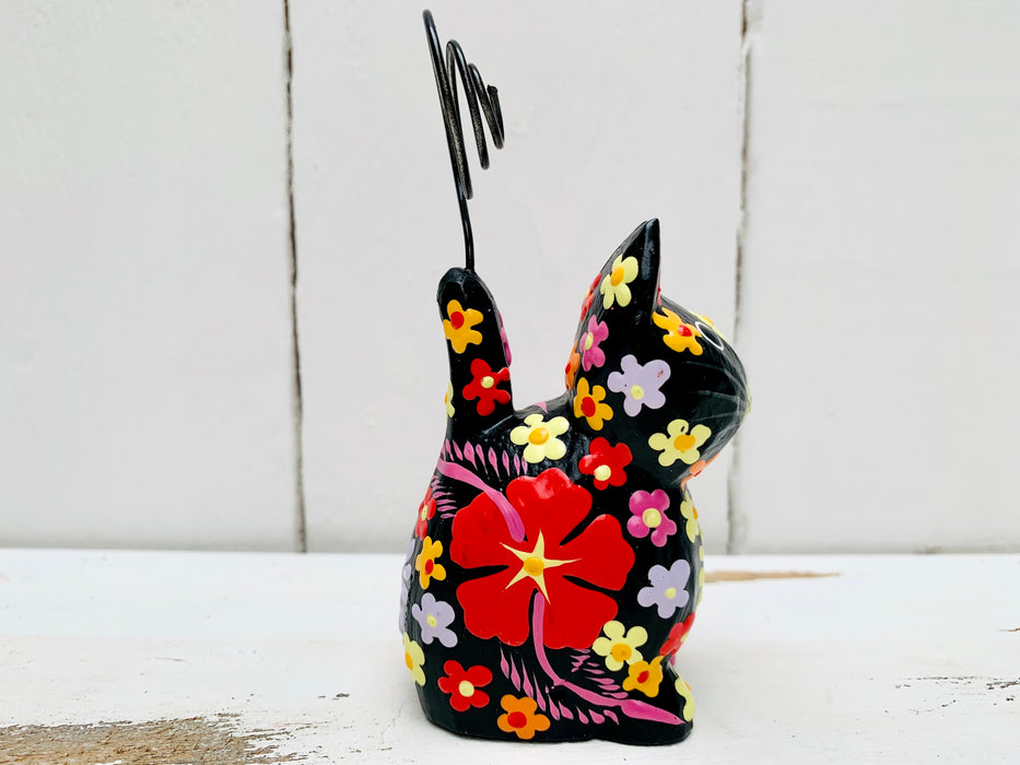 side view of wooden sitting flower kitty
