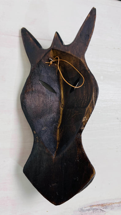 back view of zebra mask with hook attached