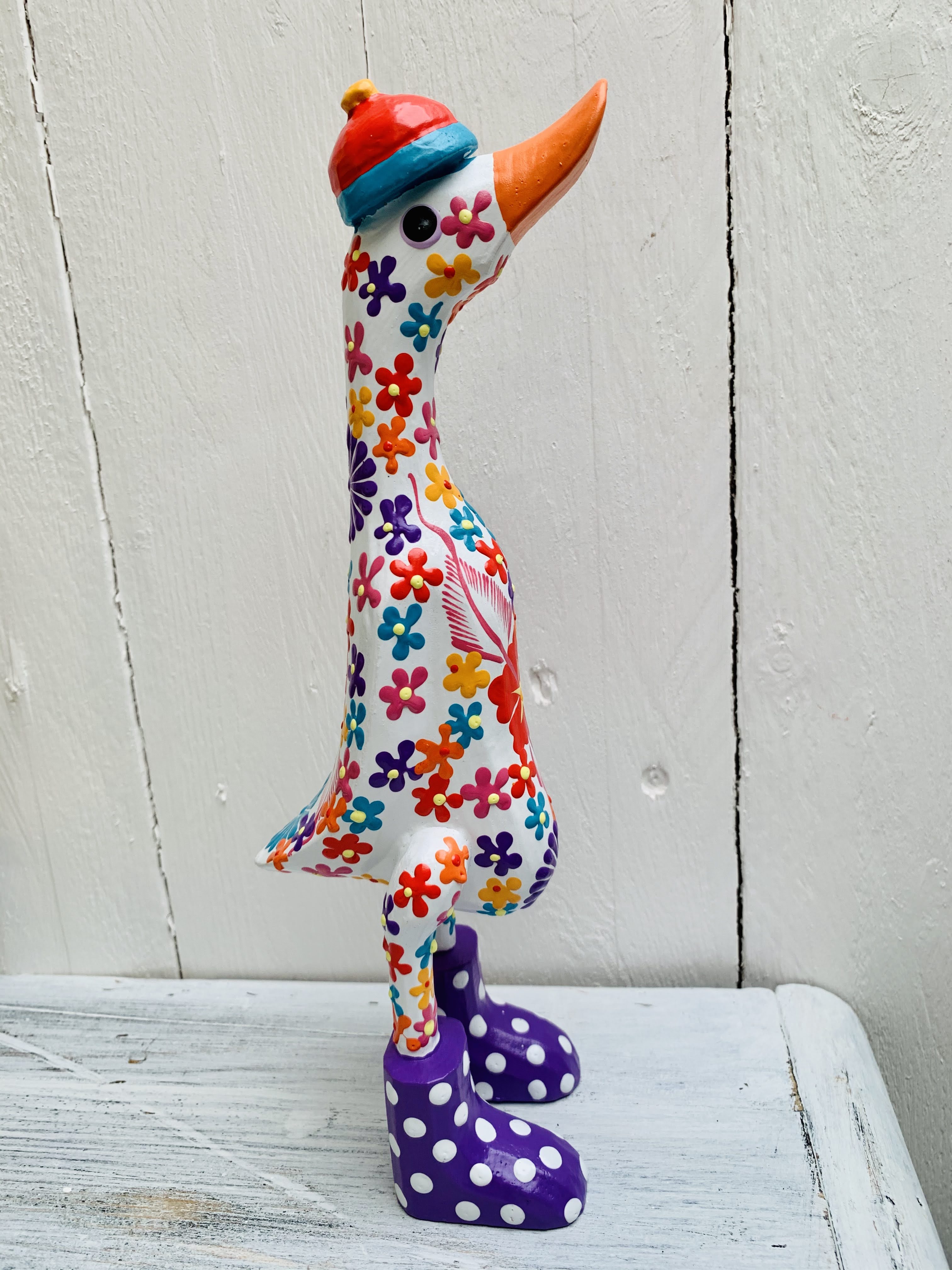 side view of flower duck in white
