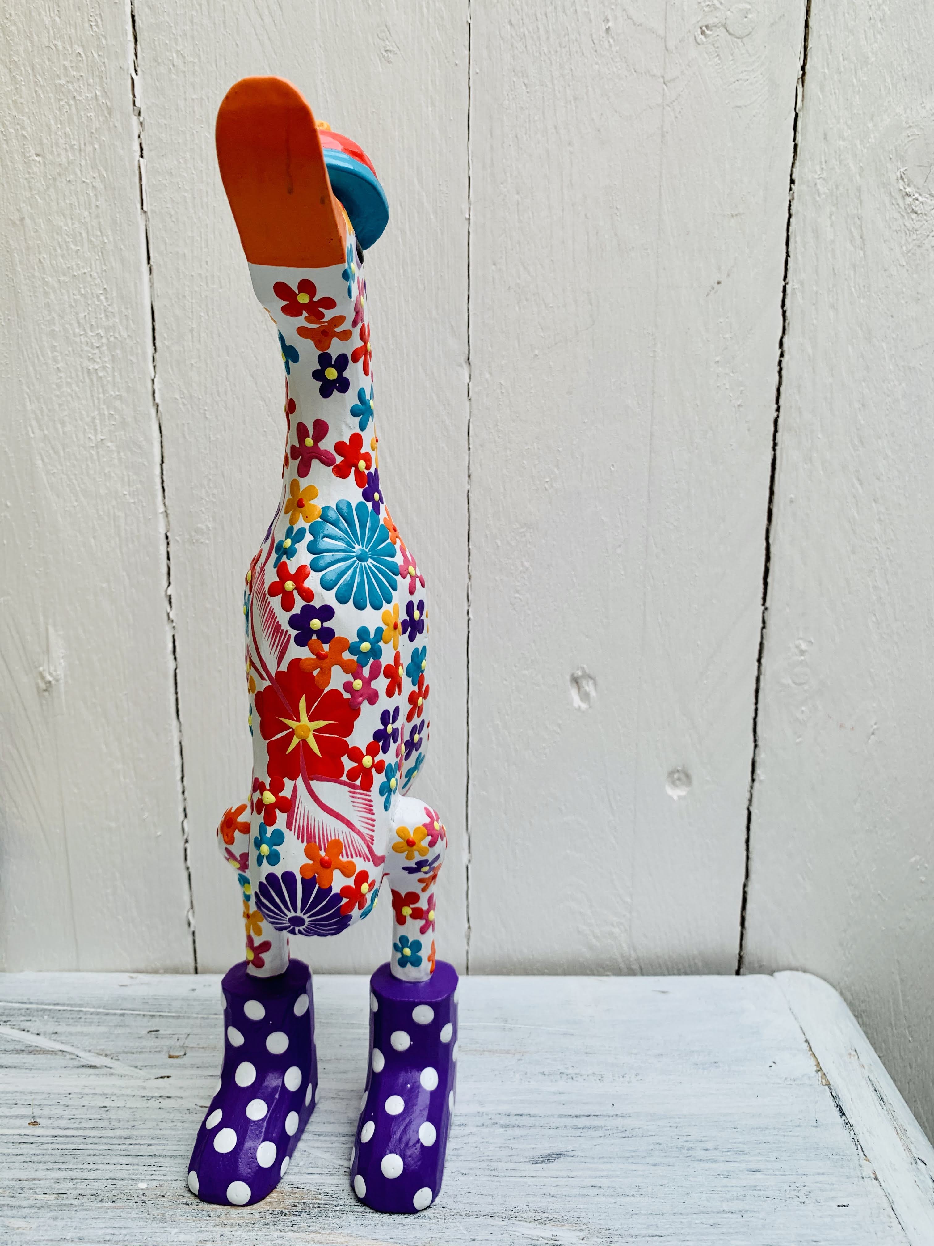 front view of wooden flower duck in white 