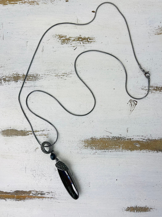 flat lay of necklace