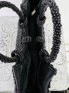 aerial view of beaded handbag and the zip