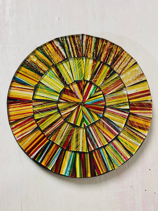 Hand-painted City Lights mosaic coaster with warm yellow, gold and earthy glass pieces on an MDF base, photographed from above on a light surface.