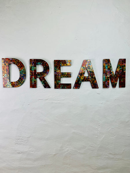 front view of Dream mosaic wall art in calypso tones on MDF base